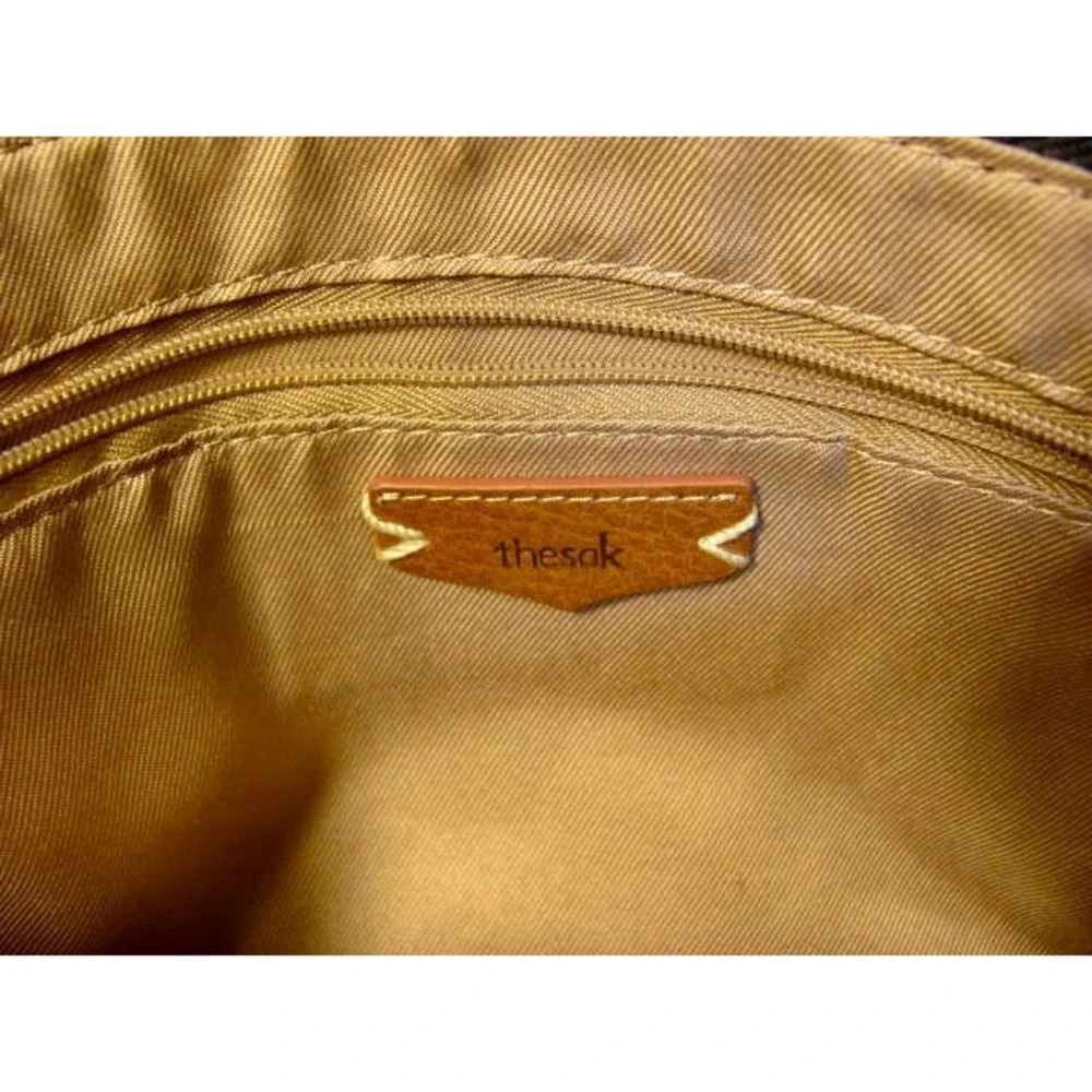 The Sak Cosmetic Clutch Embossed Black Like New